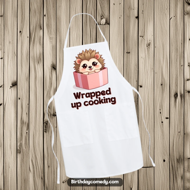 Funny hedgehog apron, a happy character rolling inside a present box, ready for culinary adventures.