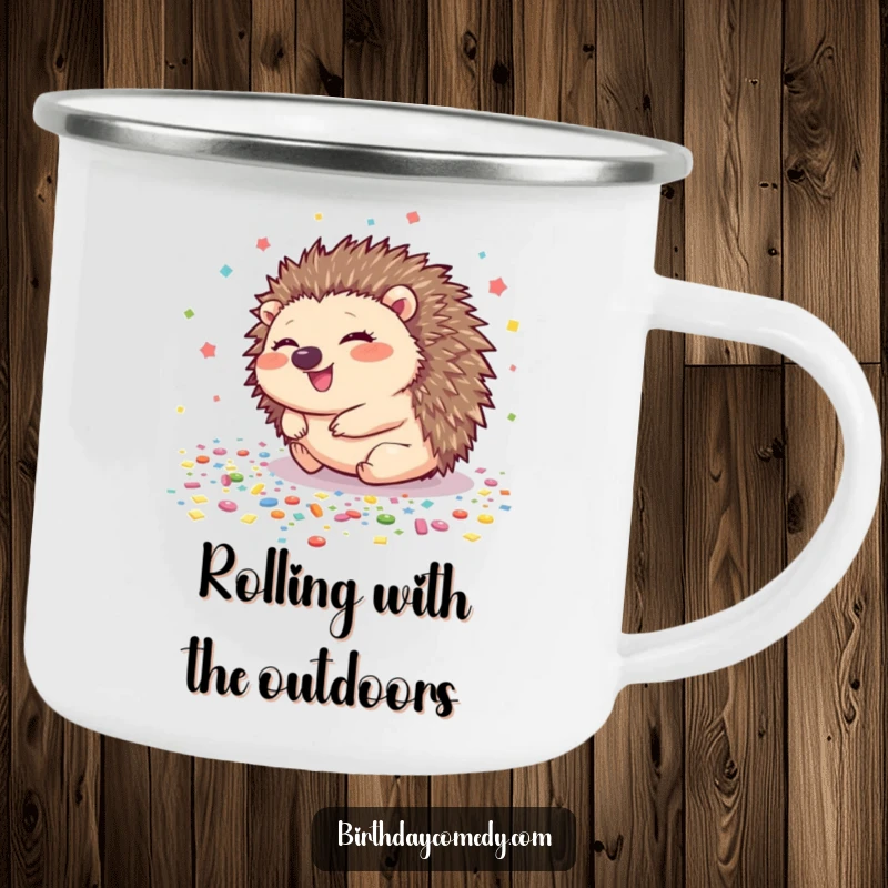 Funny hedgehog camping mug showing a giggling hedgehog rolling across a confetti floor, perfect for outdoor enjoyment.