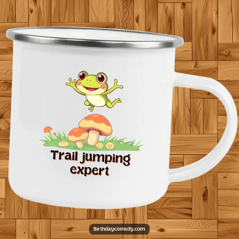 Funny Camping Mug showing a joyful frog leaping between mushrooms, designed for outdoor enthusiasts.