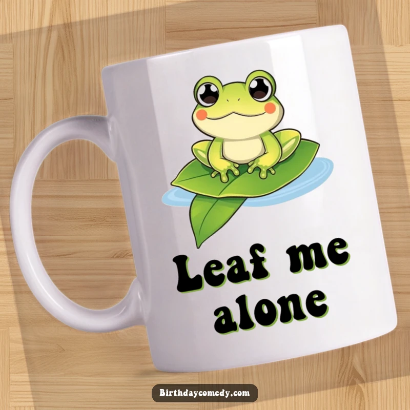 Funny frog mug showing a content frog with bulging eyes happily floating on a large leaf, a symbol of pure joy.