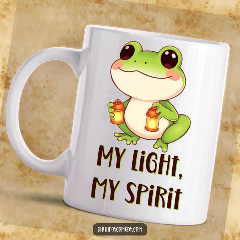 Funny mug with a smiling frog character holding a small, glowing lantern, embodying warmth and gentle light.