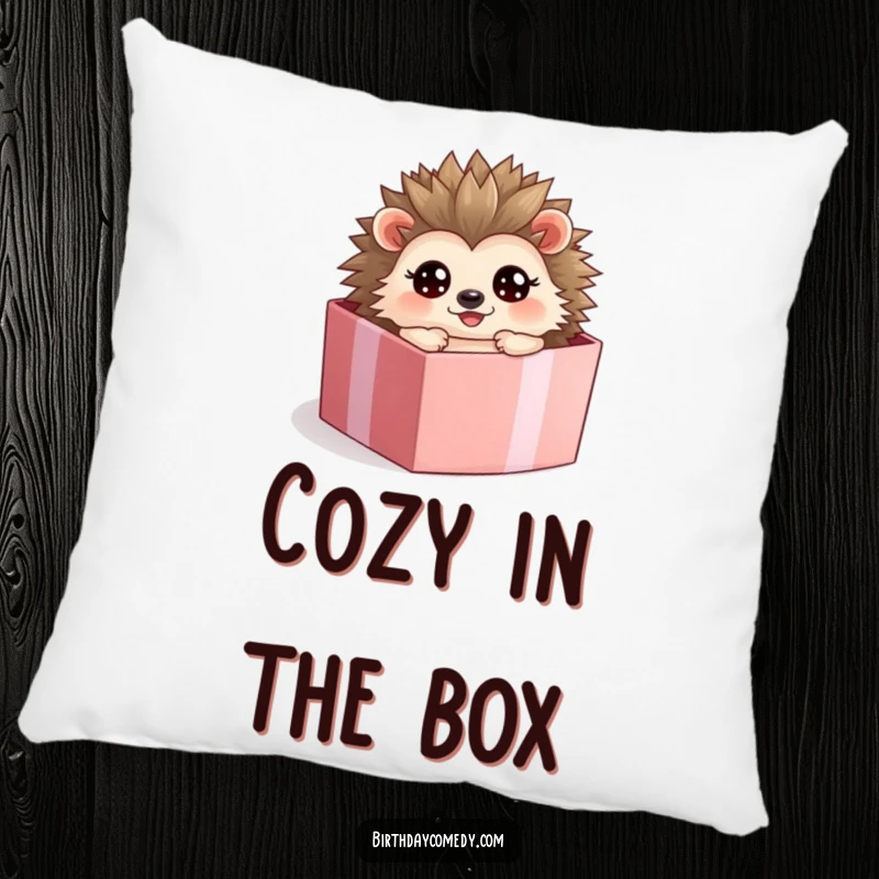 Funny hedgehog pillow, a happy character rolling inside a gift box, offering comfort and charm.