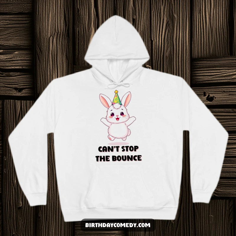 Funny bunny hoodie, a fluffy creature wearing a party hat, joyfully bouncing with infectious, happy energy.