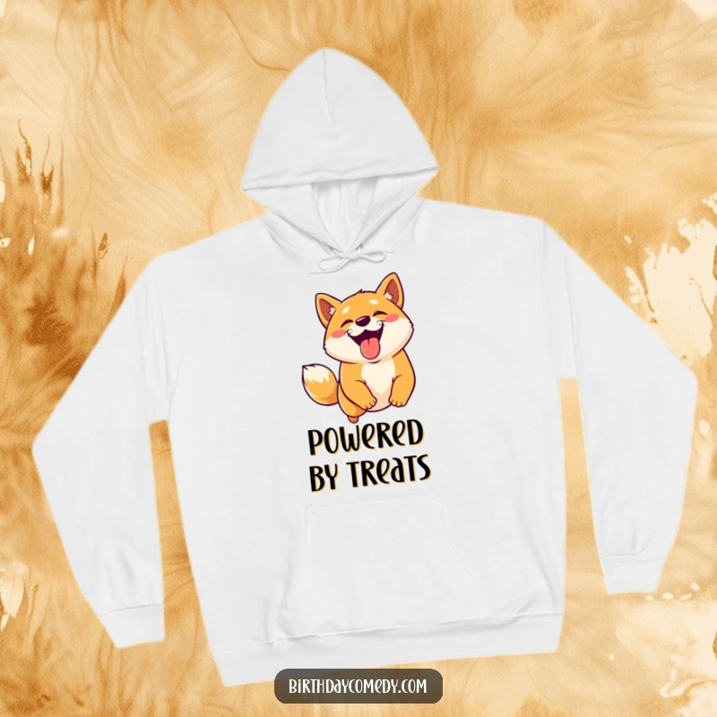 Funny Shiba Inu hoodie featuring a joyful dog with tongue out, leaping excitedly for a virtual treat, radiating happiness.
