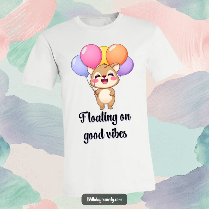 Funny t-shirt featuring a happy animal with a wide smile clutching colorful balloons, perfect for parties.