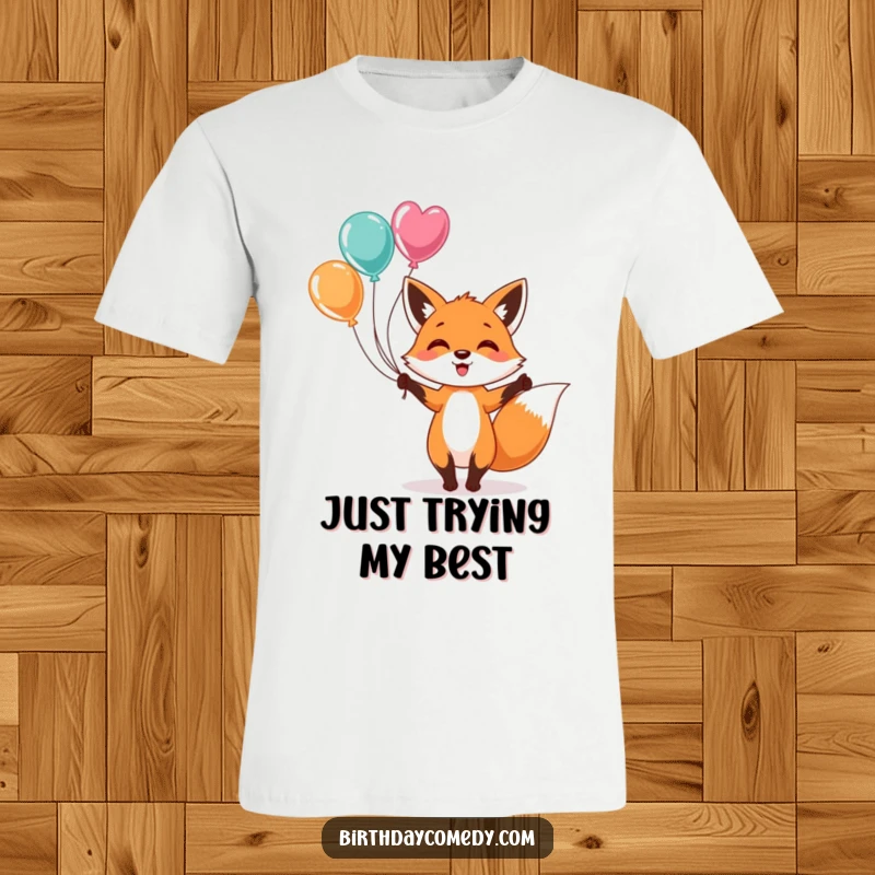 Funny T-Shirt: A cheerful fox in mid-air, expertly juggling multiple colorful balloons with a happy expression, promoting fun vibes.