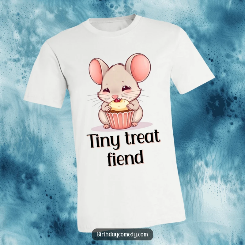 Funny t-shirt featuring a curious mouse joyfully nibbling on a tiny cupcake, capturing pure delight.